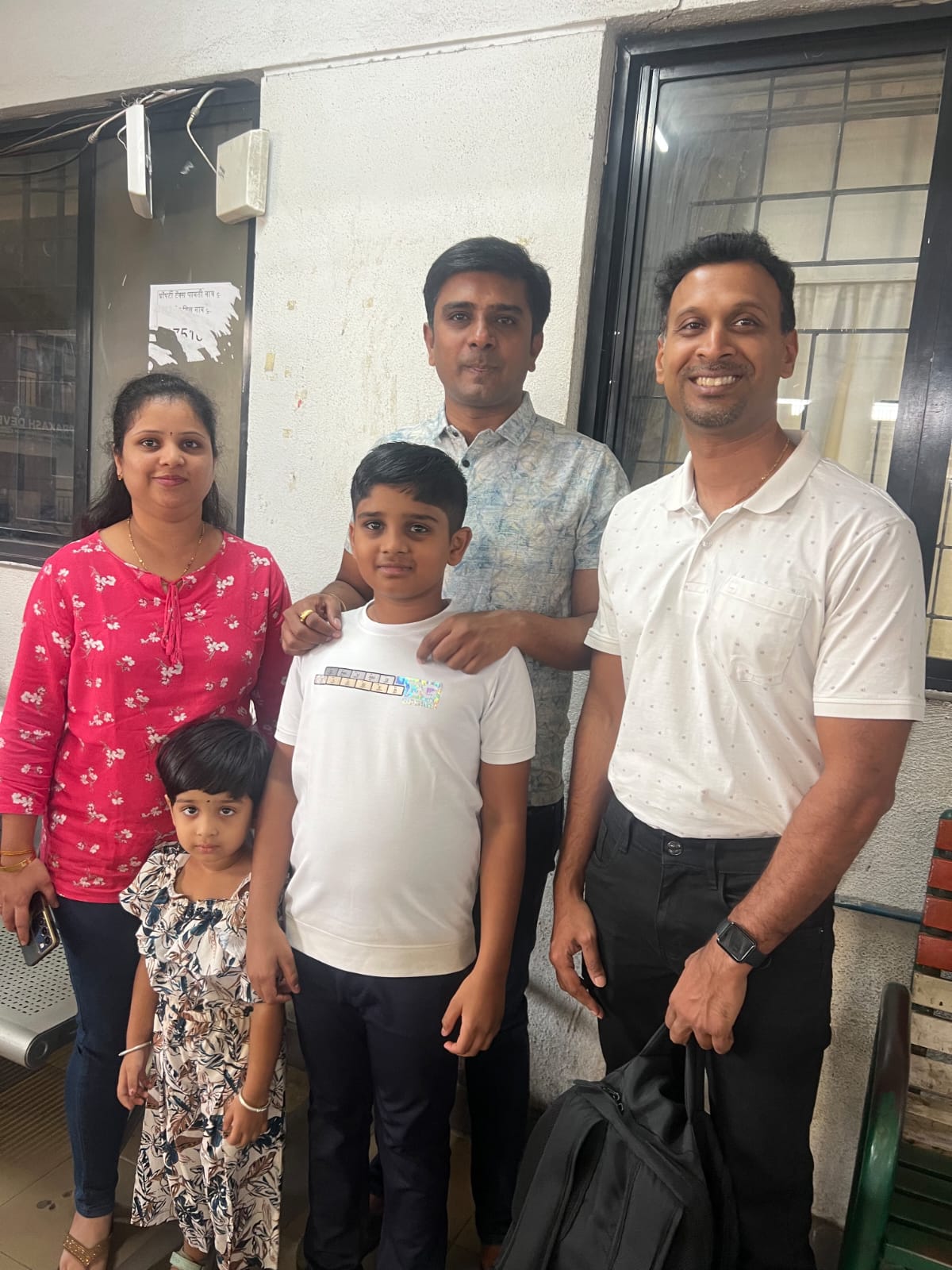 A family celebrating a successful home purchase