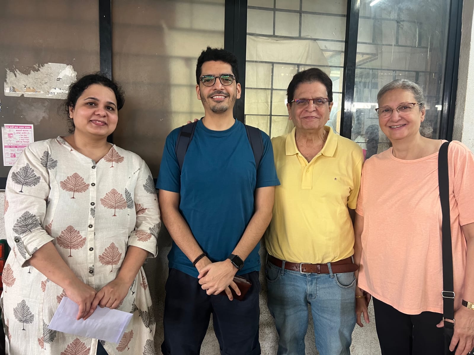 Happy homeowners with the Reliable Properties team
